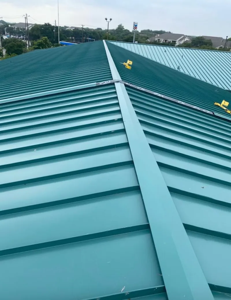 Green commercial metal roof ridge and valley for Metal Roof Repair in Palmetto Estates